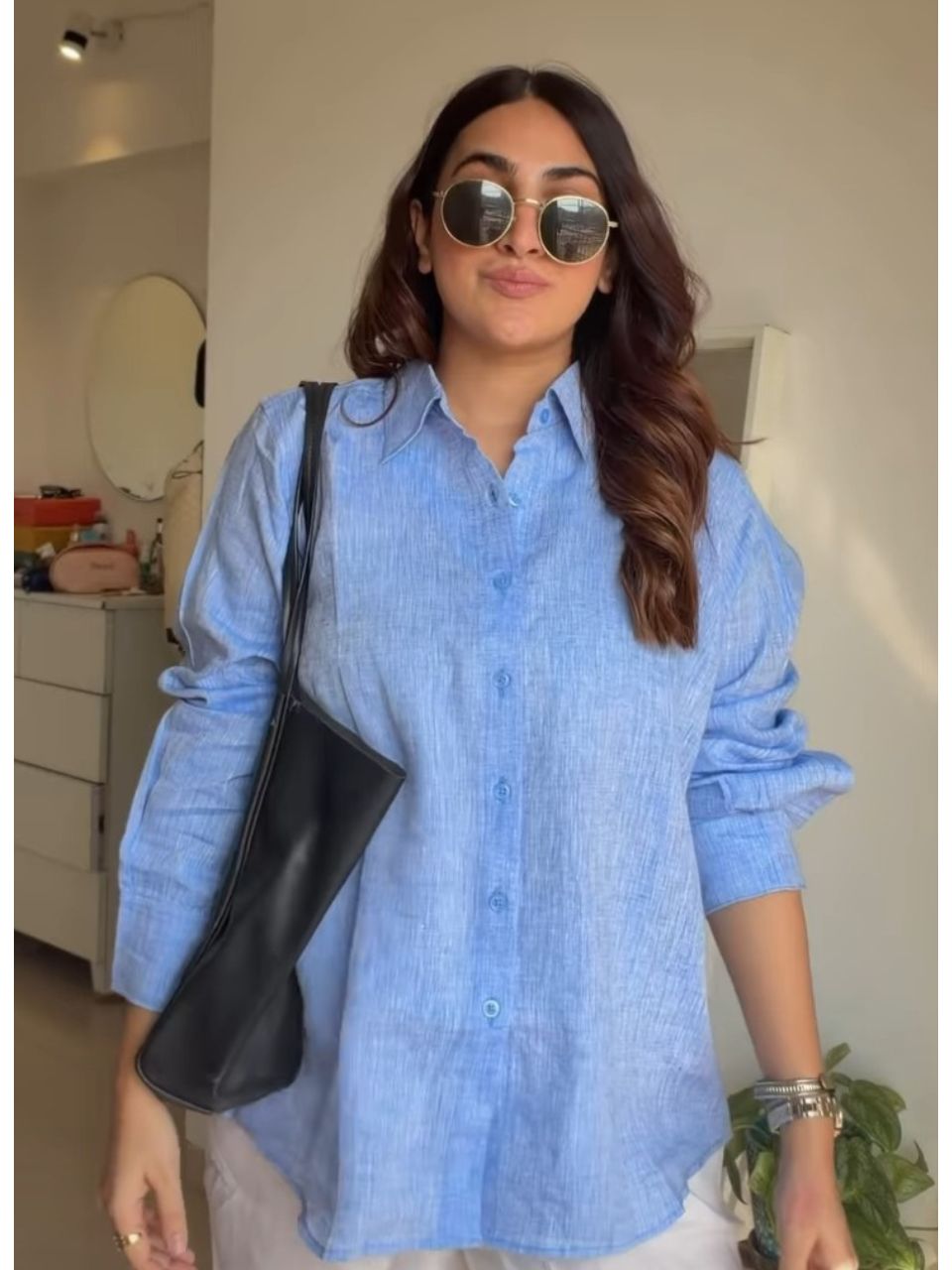 , shirt with pouch, blue pouch, small bag, matching pouch