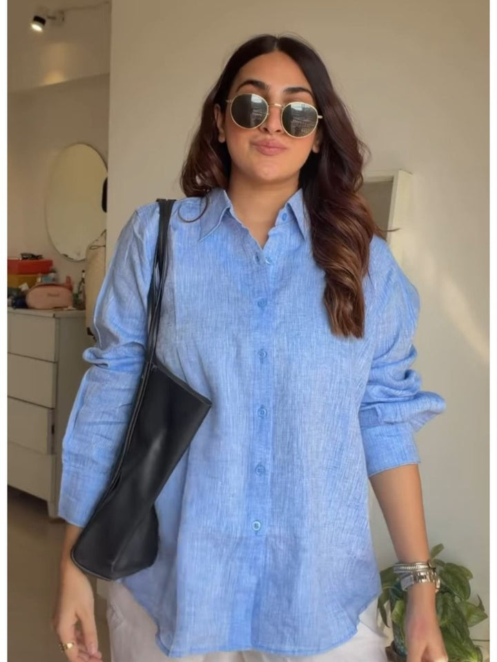 , shirt with pouch, blue pouch, small bag, matching pouch