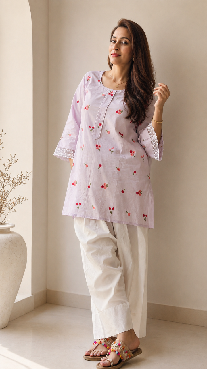 Woman wearing lilac floral embroidered kurta with white farshi salwar – Lush Layers