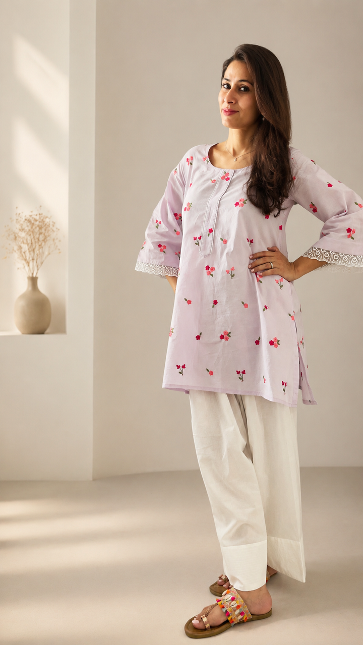 Woman wearing lilac floral embroidered kurta with white farshi salwar – Lush Layers