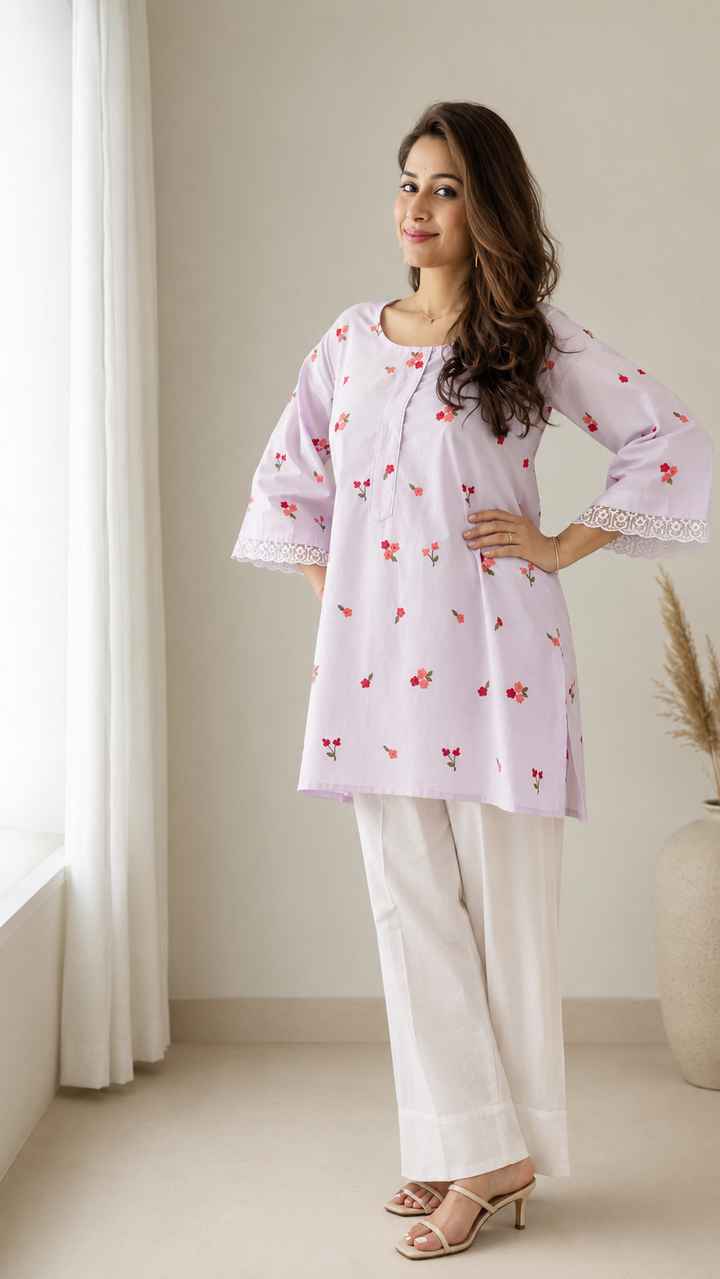 Woman wearing lilac floral embroidered kurta with white farshi salwar – Lush Layers