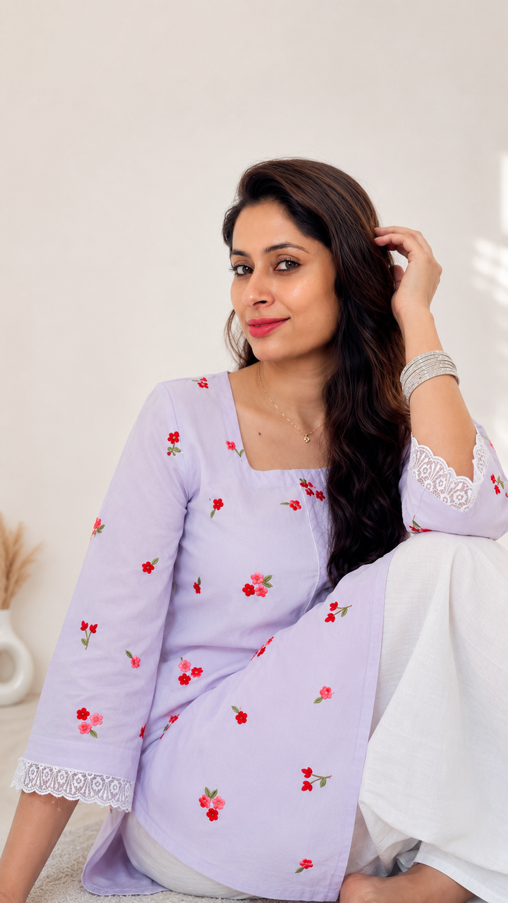 Woman wearing lilac floral embroidered kurta with white farshi salwar – Lush Layers