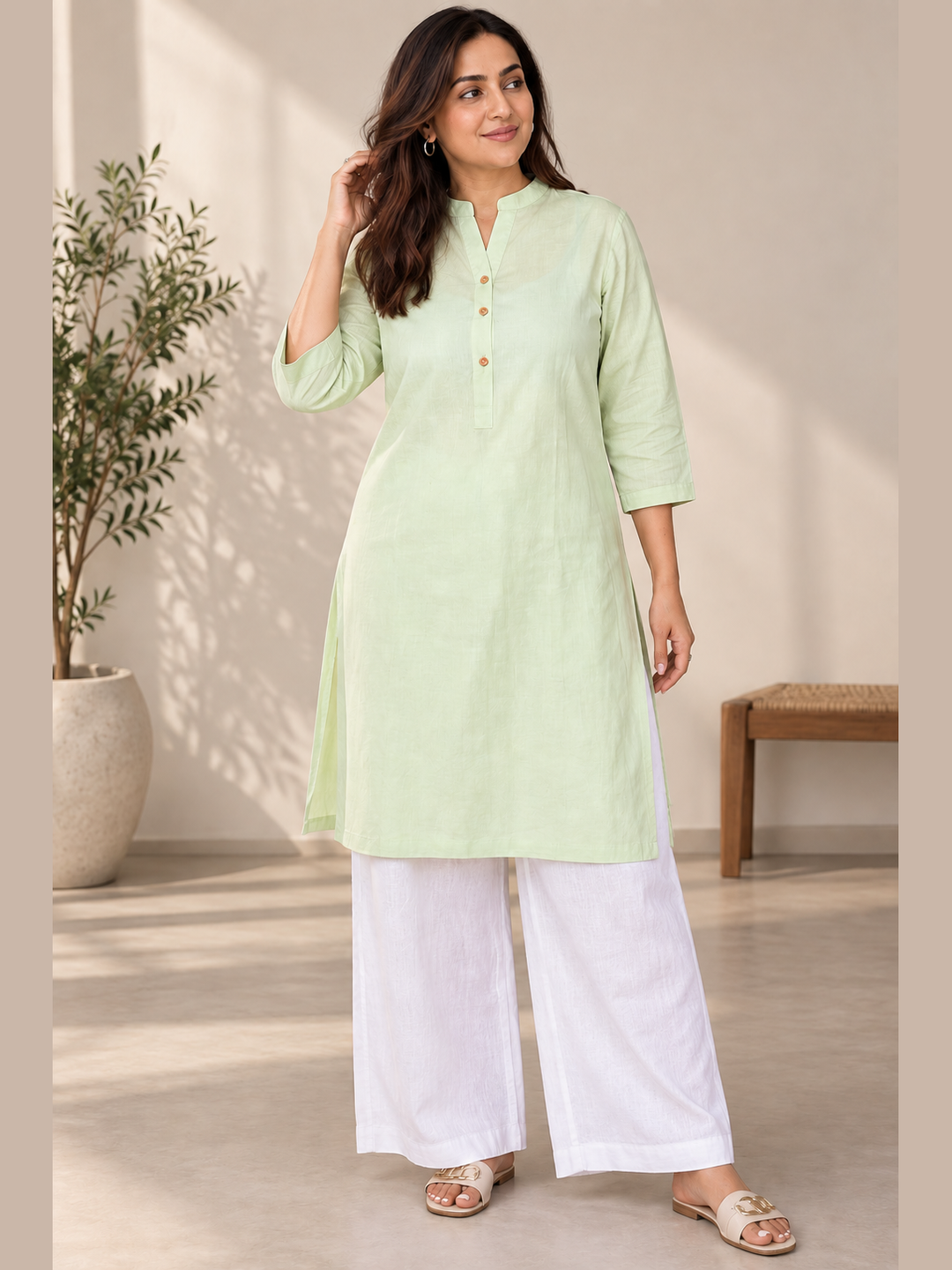 Shop the Mint Ease Cotton Linen Kurta by Lush Layers. A breathable mint green kurta with a relaxed fit, 3/4 sleeves and minimal detailing for work and everyday wear.
