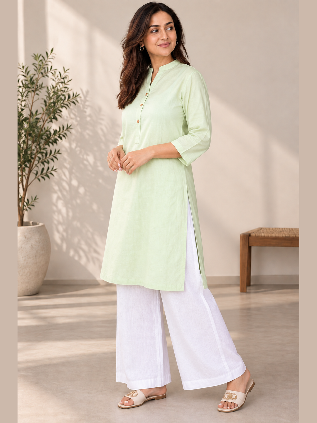 Shop the Mint Ease Cotton Linen Kurta by Lush Layers. A breathable mint green kurta with a relaxed fit, 3/4 sleeves and minimal detailing for work and everyday wear.