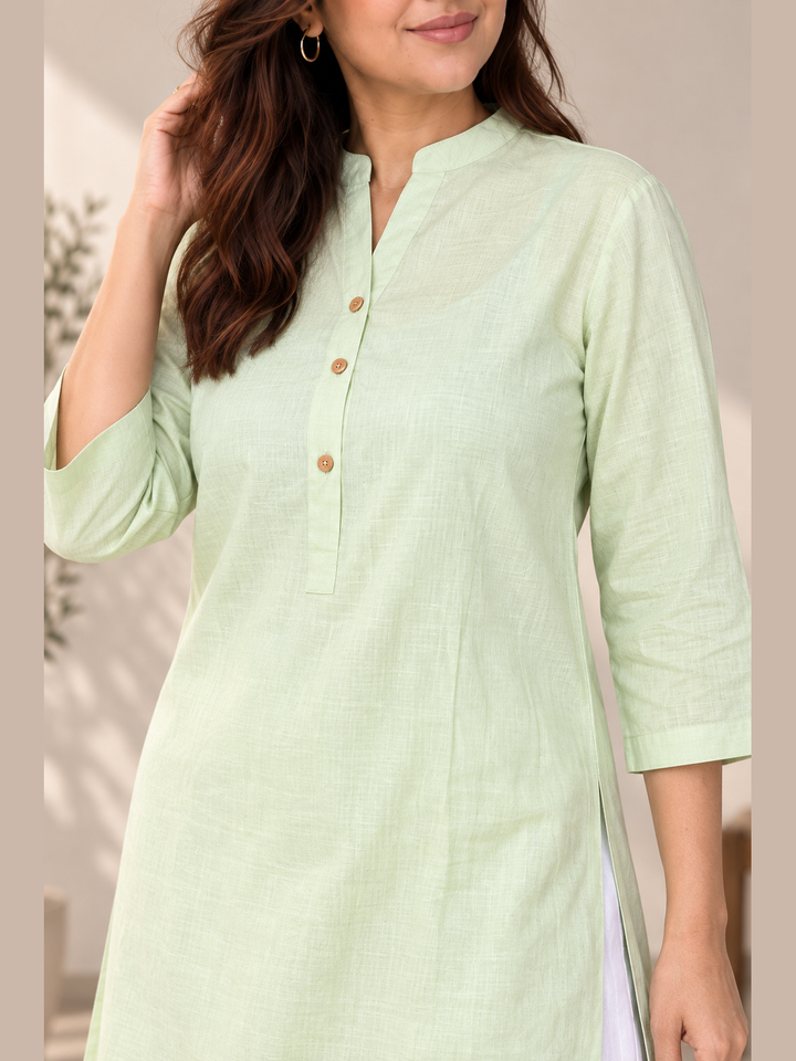 Shop the Mint Ease Cotton Linen Kurta by Lush Layers. A breathable mint green kurta with a relaxed fit, 3/4 sleeves and minimal detailing for work and everyday wear.