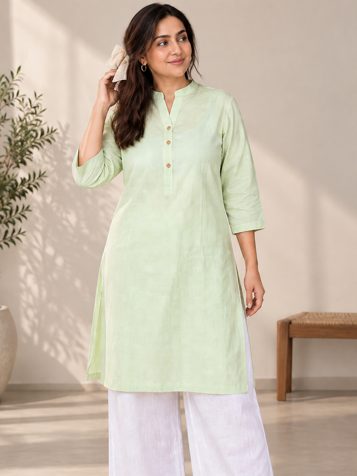 Shop the Mint Ease Cotton Linen Kurta by Lush Layers. A breathable mint green kurta with a relaxed fit, 3/4 sleeves and minimal detailing for work and everyday wear.