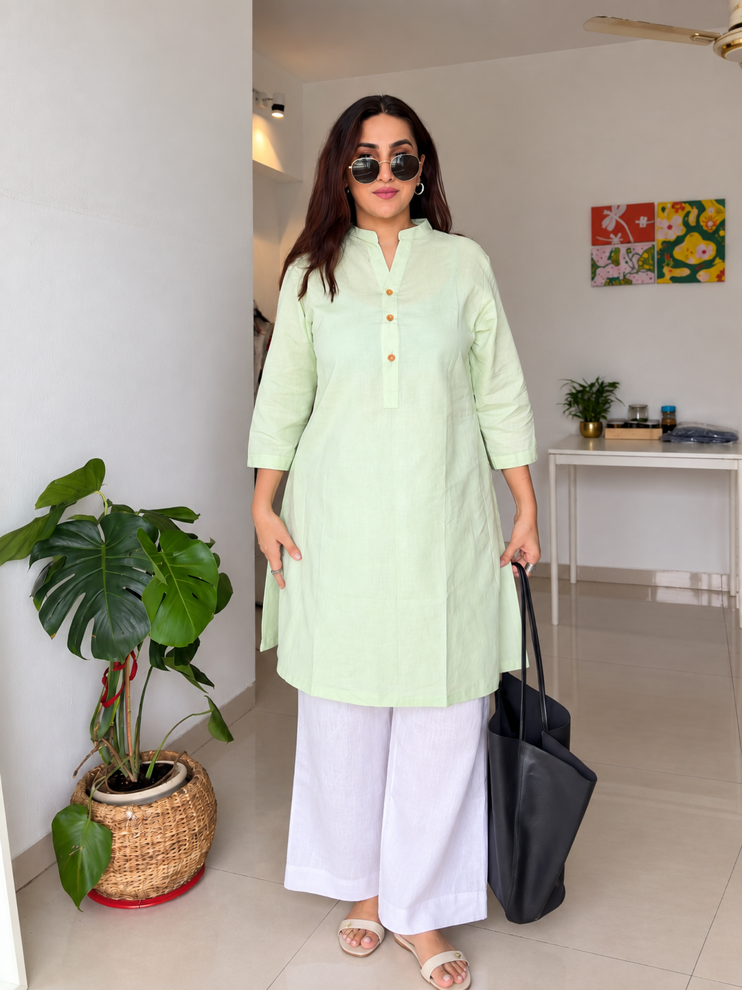 Shop the Mint Ease Cotton Linen Kurta by Lush Layers. A breathable mint green kurta with a relaxed fit, 3/4 sleeves and minimal detailing for work and everyday wear.