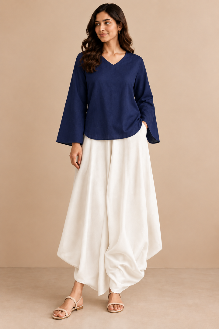 Shop ivory rayon cowl pants for women by Lush Layers. A soft, fluid draped silhouette designed for comfortable and contemporary Indo-western styling.