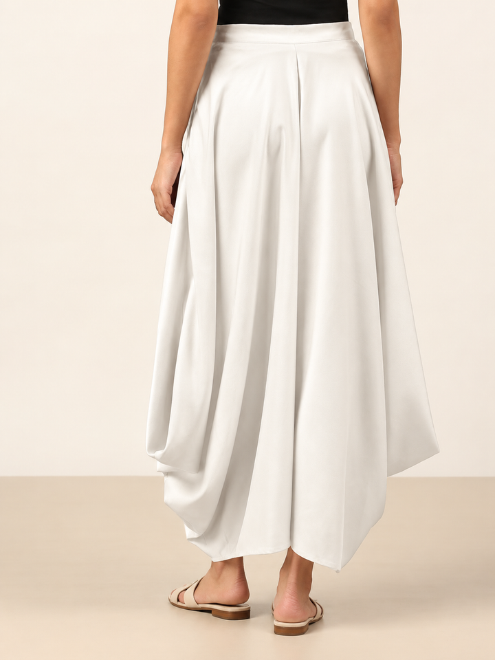 Shop ivory rayon cowl pants for women by Lush Layers. A soft, fluid draped silhouette designed for comfortable and contemporary Indo-western styling.