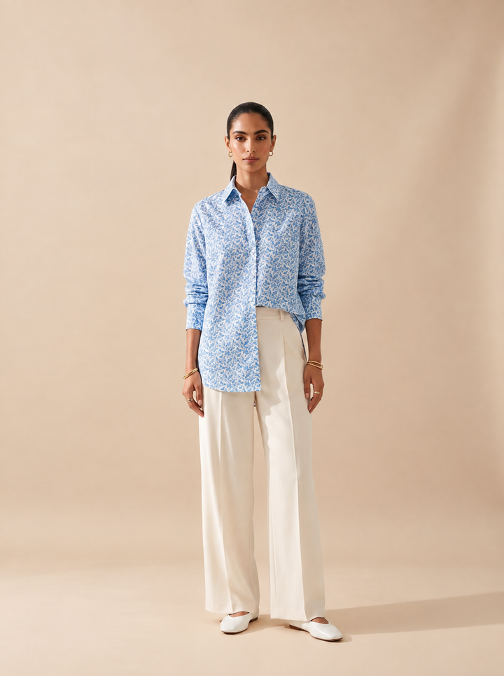 Shop this blue geometric print women’s shirt in premium cotton. A breathable and comfortable button-down style for office, travel and everyday wear.
