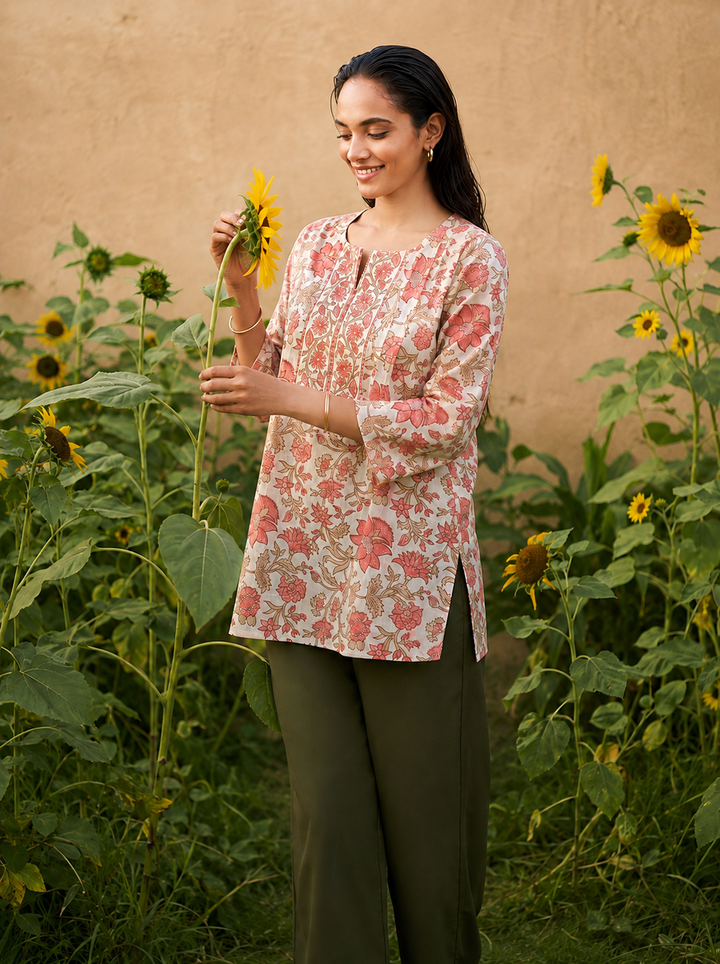 Shop the Safa Blush Floral Cotton Kurti by Lush Layers. A breathable everyday cotton kurti with delicate floral prints and an elegant detailed neckline, perfect for work and casual wear.