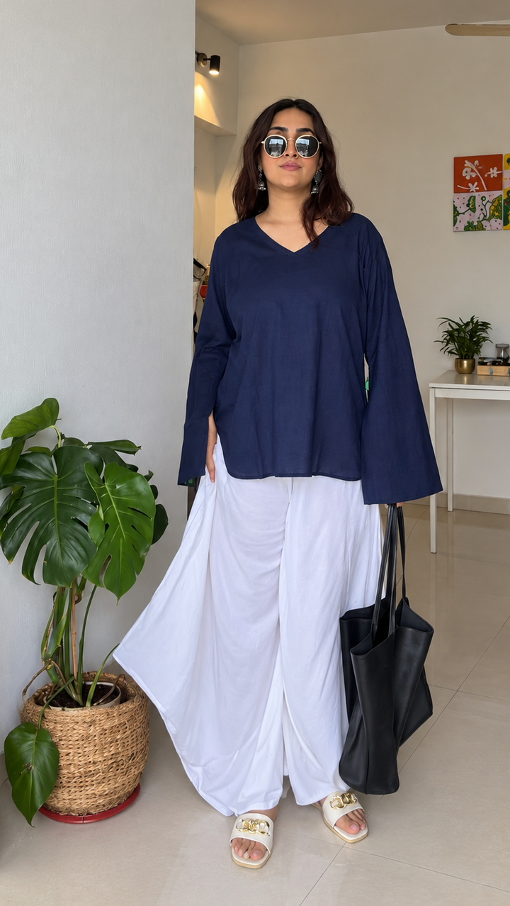 Shop ivory rayon cowl pants for women by Lush Layers. A soft, fluid draped silhouette designed for comfortable and contemporary Indo-western styling.