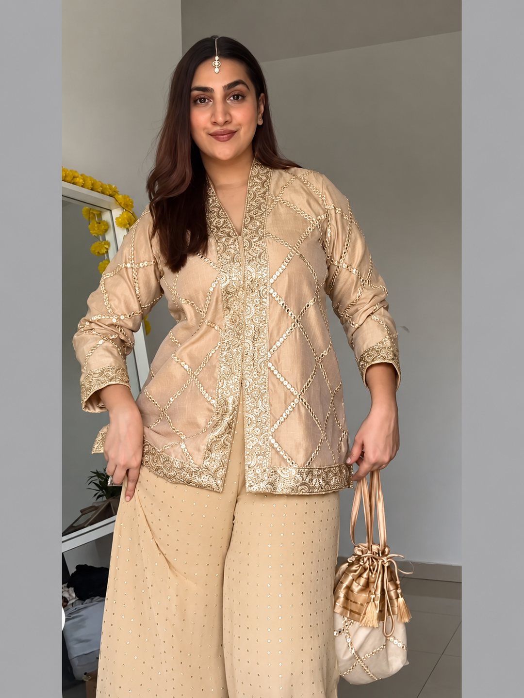 Discover the Beige Elegance Embroidered Chanderi Set by Lush Layers, featuring a detailed jacket and wide-leg trousers for festive occasions.