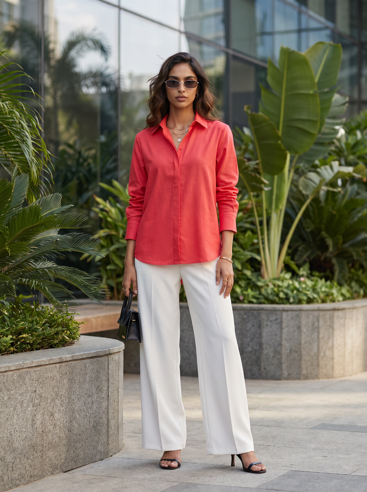Shop the Coral Ease women’s shirt by Lush Layers, crafted in premium-quality cotton with a relaxed fit and classic collar. An elegant choice for work and everyday wear.
Breathable cotton. Relaxed tailoring. Effortless colour.
A versatile coral cotton shirt designed to take you comfortably from workdays to weekends.